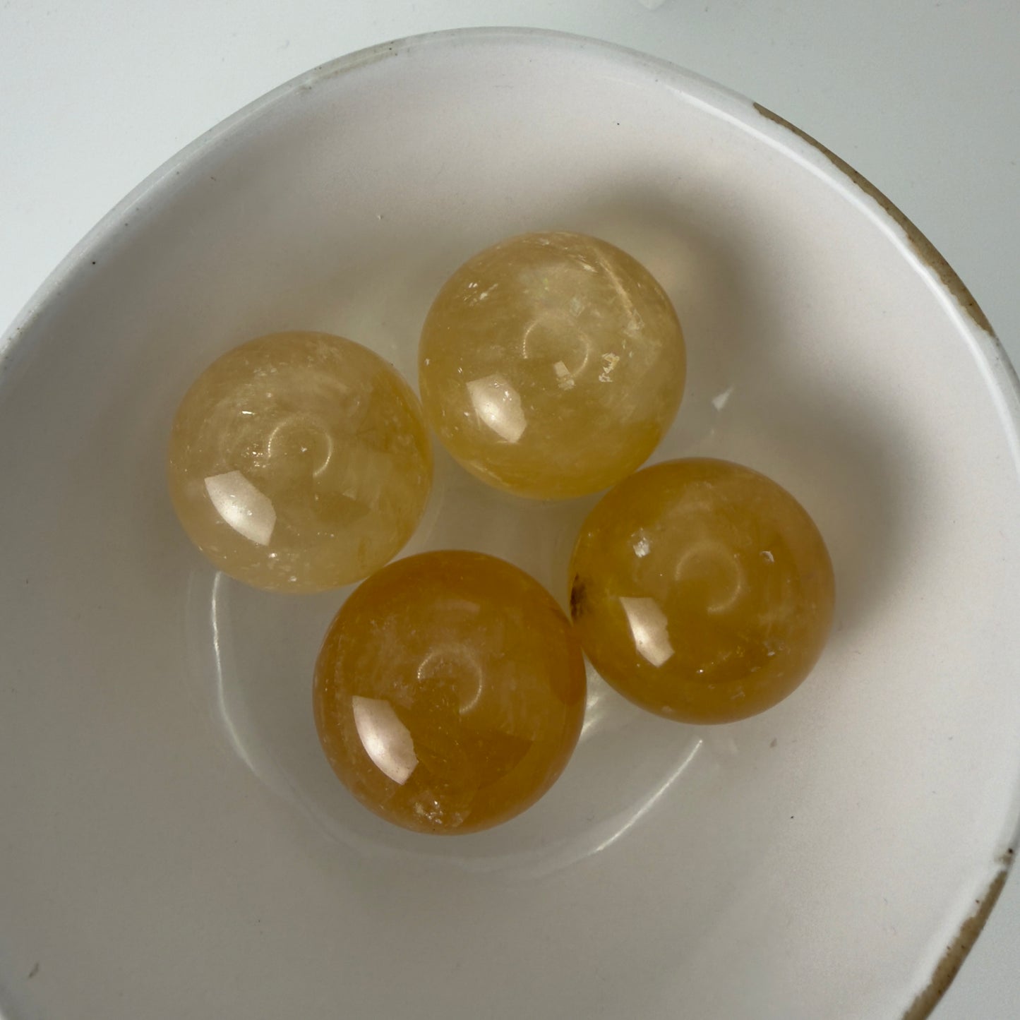Honey calcite spheres
