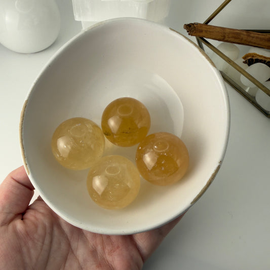 Honey calcite spheres